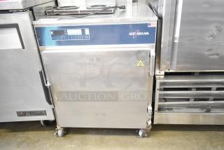 Alto Shaam Heated Holding Cabinet with digital controls, stainless steel finish, on commercial casters, in used condition.
