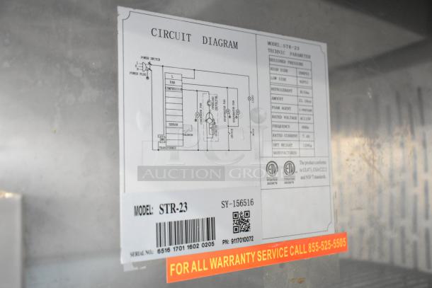 Spartan STR-23 commercial cooler label showing circuit diagram, model number, and serial number for identification.