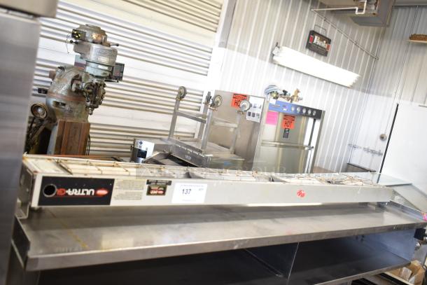 Hatco Ultra Glo Commercial Heat Strip, stainless steel, visible label, in used condition on metal countertop.