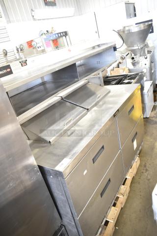 Delfield commercial sandwich salad prep table with Bain Marie mega top, 4 drawers, over shelf, 115 volts, excellent condition.