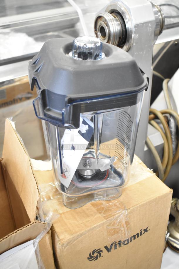 Brand new Vitamix blender pitcher, scratch and dent condition. Includes markings and original packaging.