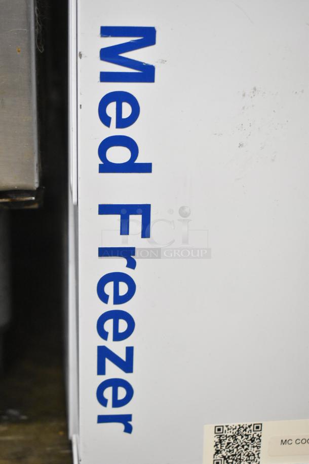 American BioTech Supply chest freezer side view showing "Med Freezer" label and QR code. Clean condition.