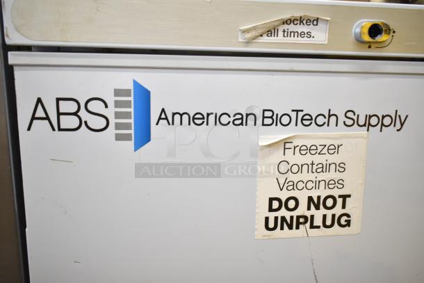American BioTech Supply chest freezer with vaccine warning label, ABS logo visible, used condition.