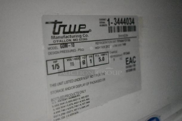 True GDM-10 Cooler Merchandiser label showing 115V, single phase, 1/5 HP, 5.0 amps; commercial use details.