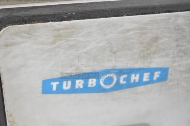Turbochef logo on NGC Commercial Electric Rapid Cook Oven. Visible wear; ideal for fast cooking solutions.