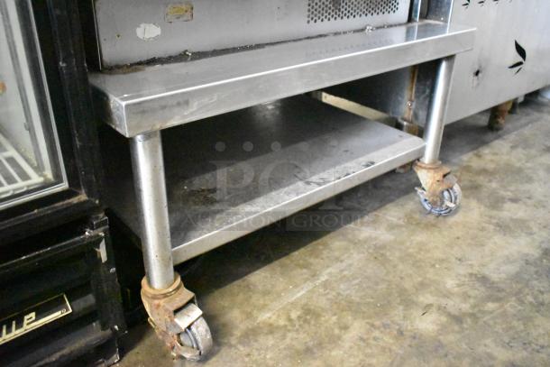 Turbochef NGC rapid cook ovens on equipment stand, electric, 208/240V, 1 phase, exhibits wear, rusted caster wheels.