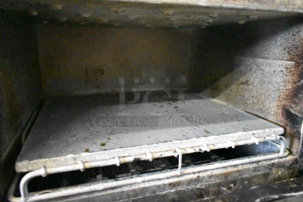 Turbochef NGC Rapid Cook Oven interior, shows wear and residue. Commercial-grade, electric, 208/240V, 1 phase.