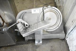 Hobart Commercial Countertop Meat Slicer, 115 Volts, 1 Phase, stainless steel, used condition, auction tag 148 visible.