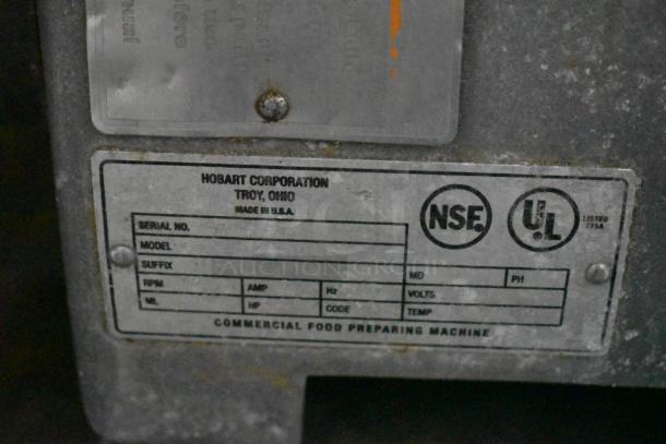 Hobart Commercial Meat Slicer label, NSF and UL certified, 115V, 1 Phase, made in USA, for food preparation.