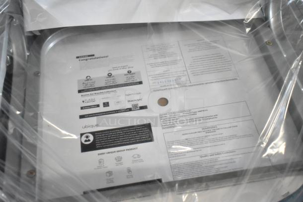 Packaging of Flash Furniture HERCULES Series Crown Back Banquet Chair. Visible labels list safety guidelines and brand details.