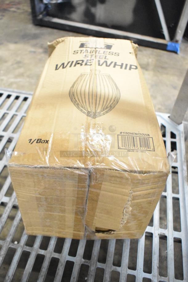 Cardboard box labeled "Stainless Steel Wire Whip" and "#190HCM30WA," new but with visible dents and scratches.