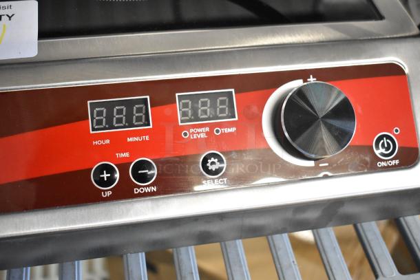 Brand new Avantco 177IC1800 countertop induction range. Digital display, control knob, minor scratches on surface. 120V, 1 Phase.