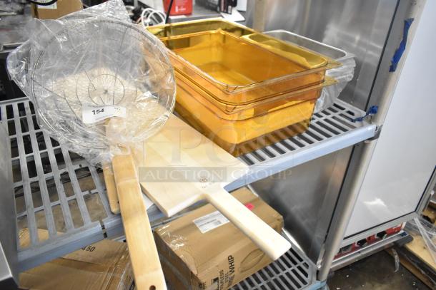 8 brand new kitchen items including Emperor's Select 12" skimmer, American Metalcraft pizza peel, Carlisle food pans.
