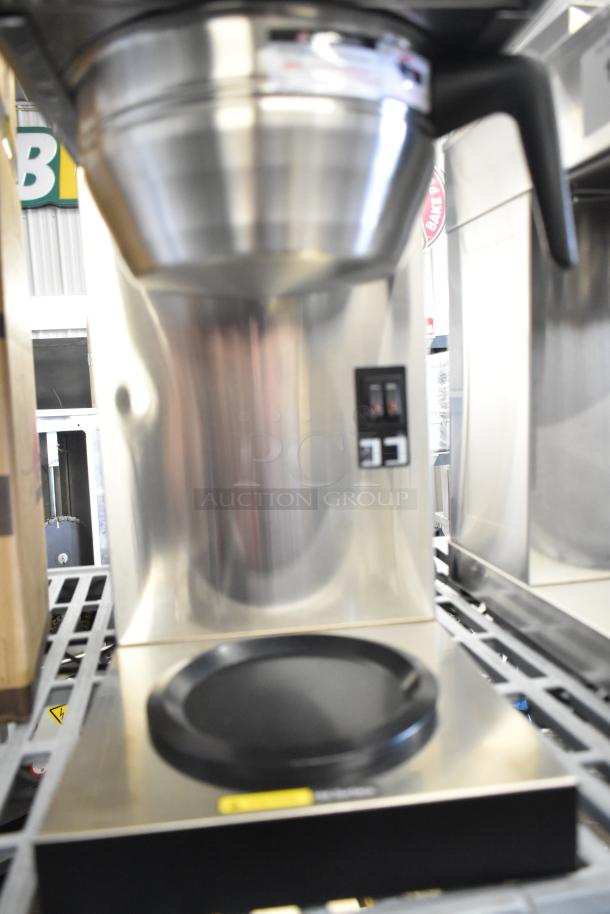 Brand new Avantco CMA1L2U automatic coffee maker, 3 decanter warmers, 120 volts, evident surface dents.