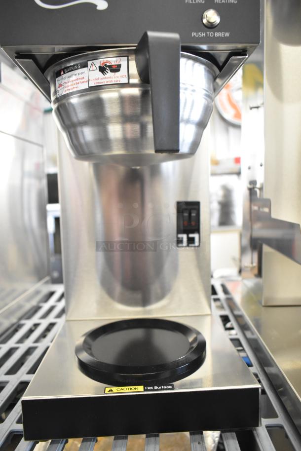 Brand new Avantco CMA2B automatic coffee maker with 2 decanter warmers, 120V, showing "Hot Surface" caution label.