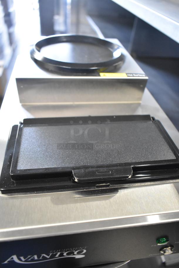 Brand new Avantco CMA2B coffee maker with dual decanter warmers, 120V, 1 phase, visible branding, minor scratches.