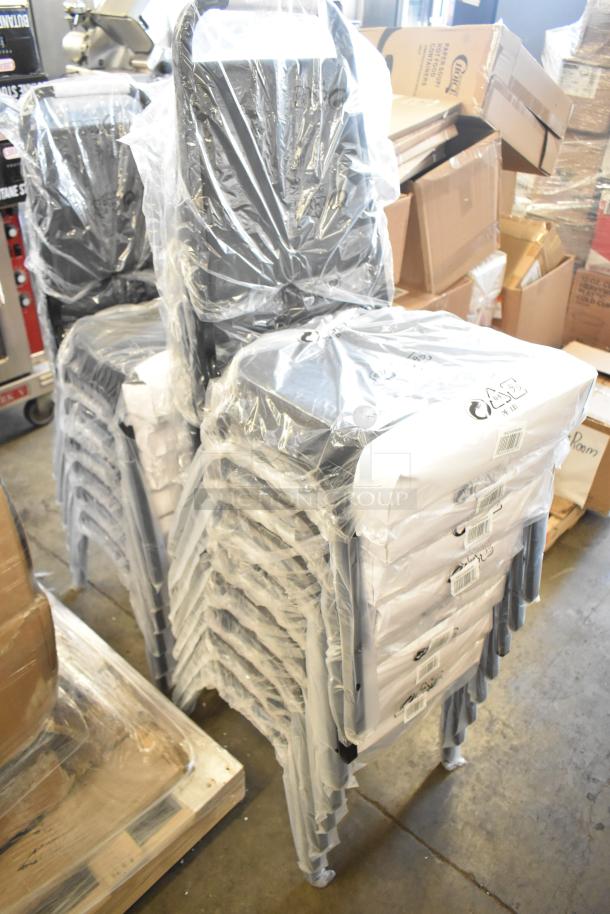 Stack of 14 new Lancaster Table & Seating black stackable chairs, with 2" padded seats, in packaging.
