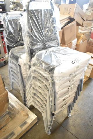 Stack of 14 new Lancaster Table & Seating black stackable chairs, with 2" padded seats, in packaging.