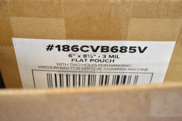 Box labeled #186CVB685V contains 6"x8.5" flat vacuum pouches, 3 mil, with hanger holes for chamber machines. Brand new.