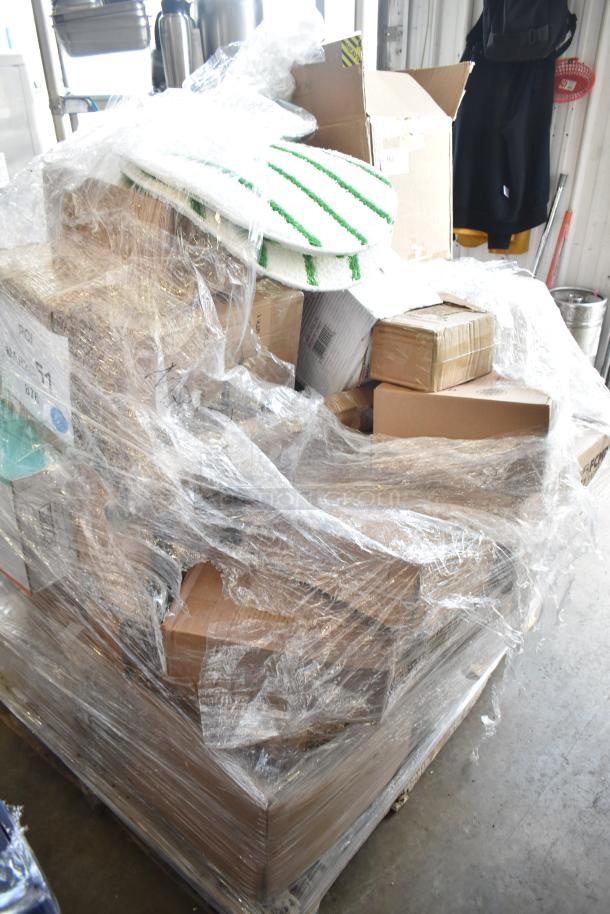 Pallet with 30 brand new scratch and dent items wrapped in plastic, including hotel pans, spoons, and juice dispenser.