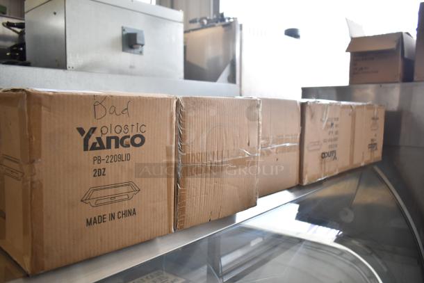 6 boxes of Yanco PB-2209LID covers, 2 dozen per box, new condition. Marked "Plastic Yanco, Made in China."