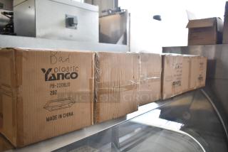 6 boxes of Yanco PB-2209LID covers, 2 dozen per box, new condition. Marked "Plastic Yanco, Made in China."