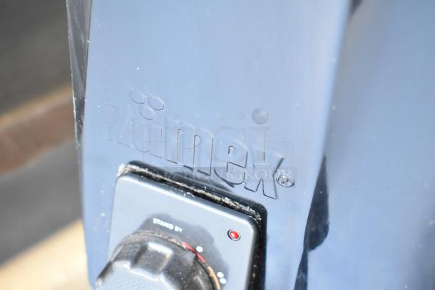 Zumex Multifruit Countertop Juicer, 120 volts, 1 phase, featuring embossed Zumex logo and control dial, good condition.