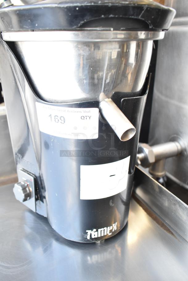 Zumex Multifruit countertop juicer, model Multifruit, 120V, 1 Phase, black finish, stainless components, fair condition, visible markings.