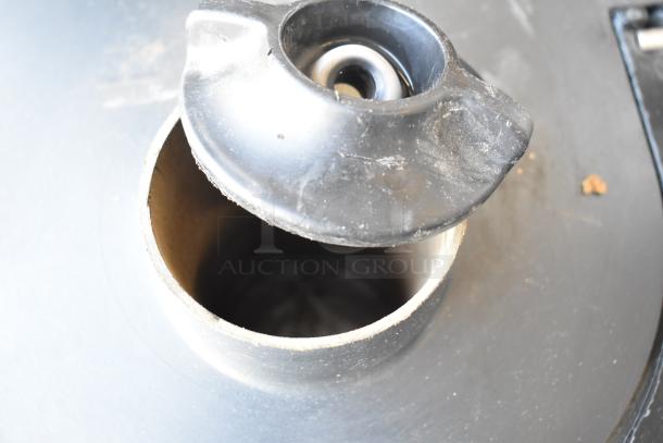 Zumex Multifruit Countertop Juicer close-up, showing chute detail. Model Multifruit, 120 Volts, 1 Phase.