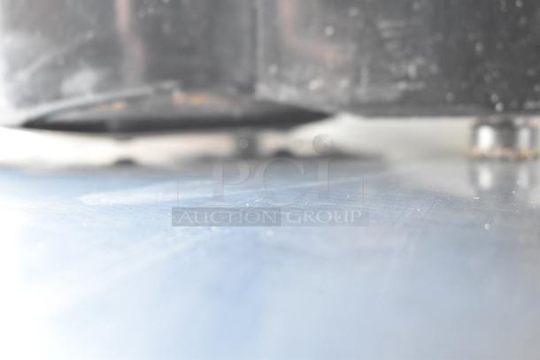 Zumex Multifruit countertop juicer, model Multifruit. Features 120 volts, 1 phase. Image shows close-up detail.