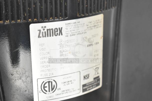 Zumex Multifruit Juicer label showing model, serial number, black color, single phase, and ETL, NSF certifications.