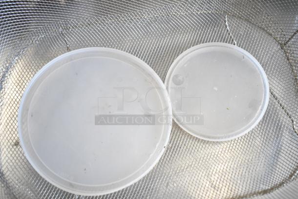 Set of 11 items including wire basket and plastic lids. Multipurpose, good condition, versatile use.