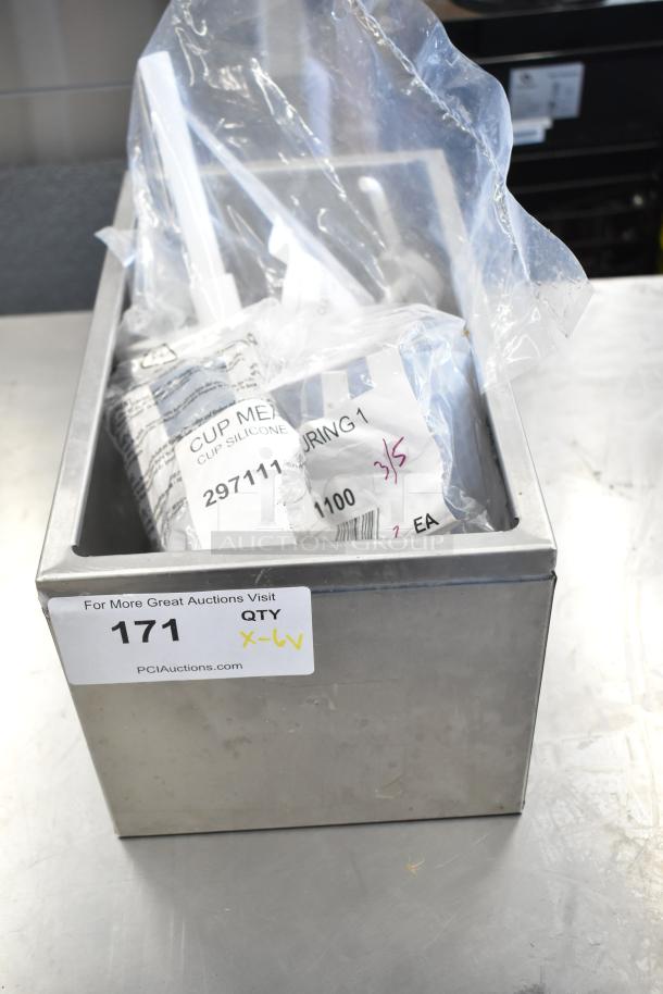 Box containing 6 items including OXO 11161100 Good Grips 1 Cup Squeeze & Pour Silicone Measuring Cup, pump top, basting brush.