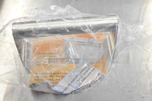 6 various kitchen items in packaging, including an OXO 1 Cup Squeeze & Pour Silicone Measuring Cup. Brand-new condition.