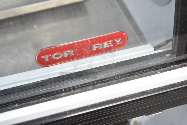 2016 Torrey TEM150+ commercial deli display case, glass front with Torrey logo, on casters, 120V, 1 phase.