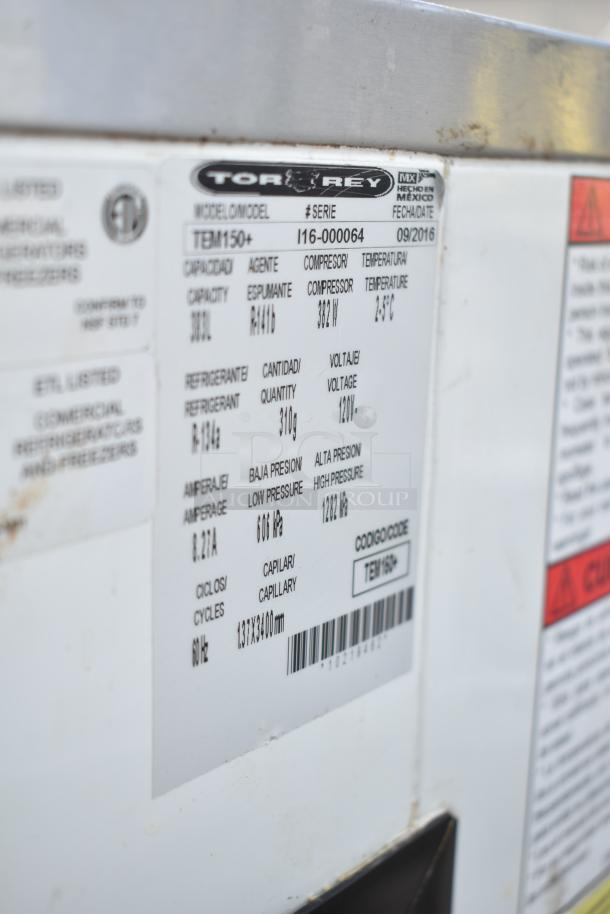 2016 Torrey TEM150+ deli display case label showing model info, capacity, voltage, and specifications. 