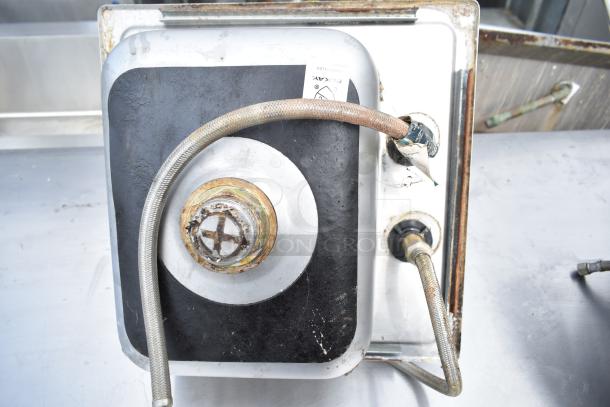 Two single bay drop-in sinks, stainless steel, with visible plumbing connections. Used condition, label "ELKAY" present.