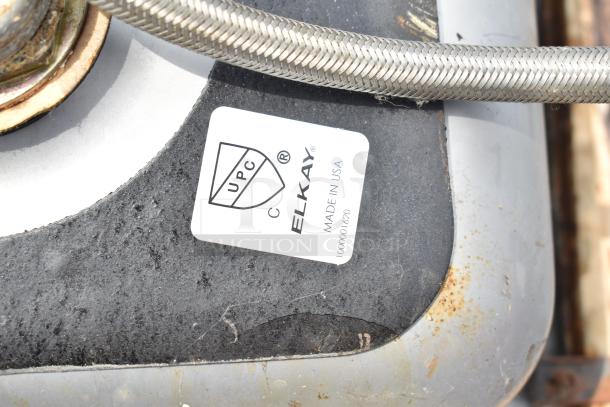 Elkay single bay drop-in sink, UPC certified, made in USA. Slight wear visible. Label shows "10000001620."