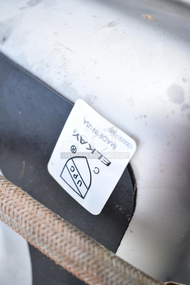 Elkay single bay drop-in sink label, UPC certified, made in USA, model 1000001520 visible, stainless steel finish.