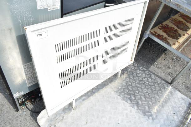 White metal panel with ventilation slots, showing slight rust on edges. Label reads "176 QTY 1". Sturdy construction.