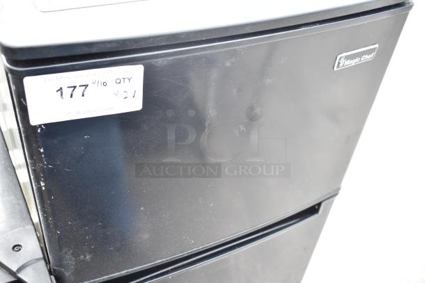 Mini fridge by Magic Chef, model HMDR450BE, slightly worn, 115V, 1 phase, visible label with auction details.