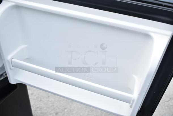 Magic Chef HMDR450BE mini cooler open door with internal shelf. 115 volts, 1 phase. Clean condition.