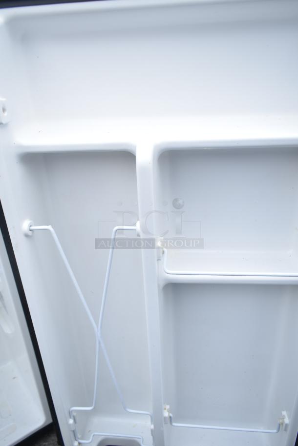 2 mini coolers, Magic Chef HMDR450BE & Insignia NS-CF33BK8, 115V, 1 phase, interior view showing shelves and wire holders.