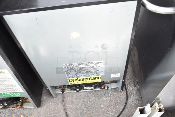 Two mini coolers, models Magic Chef HMDR450BE and Insignia NS-CF33BK8, 115V, 1 phase, Cyclopentane refrigerant label visible.