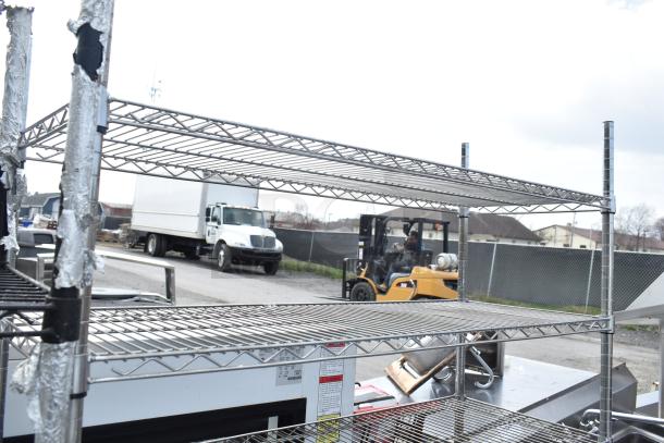 Chrome finish 6-tier wire shelving unit in outdoor setting. Requires buyer dismantling. Consider freight charges.