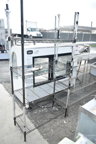 Black Finish 4 Tier Wire Shelving Unit. BUYER MUST DISMANTLE. PCI CANNOT DISMANTLE FOR SHIPPING. PLEASE CONSIDER FREIGHT CHARGES.