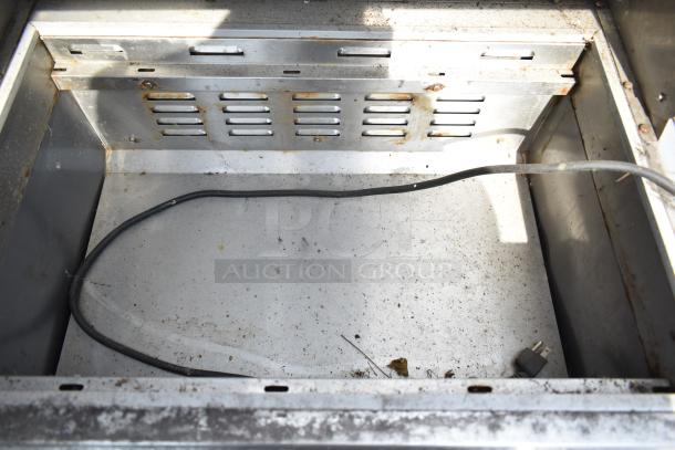 Ascend JSP-2708 commercial sandwich salad prep table interior. Notable wear and a visible power cord. 115 Volts, 1 Phase.