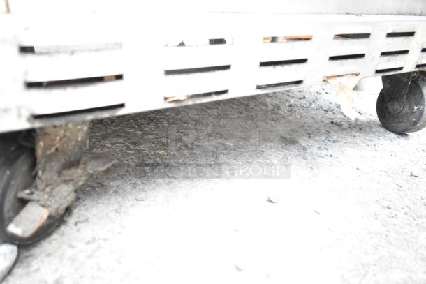 Ascend JSP-2708 Sandwich Salad Prep Table, visible caster with rust. 115 Volts, 1 Phase, model JSP-2708, commercial use.