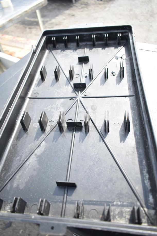 Black Poly 3 Tier Cart with commercial casters, durable plastic, textured trays, suitable for heavy-duty use.