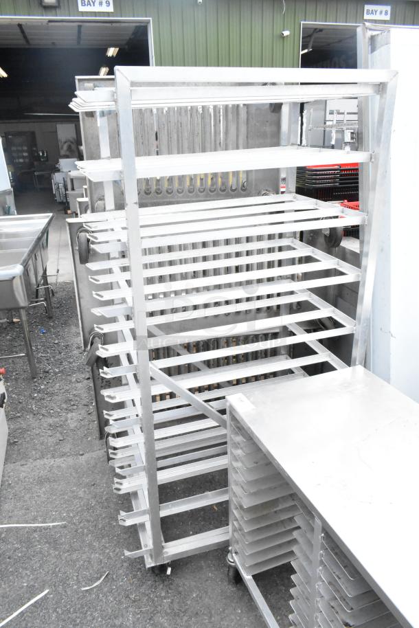 Commercial #10 can rack with multiple shelves and smoothly gliding casters, made of durable metal, ideal for bulk storage.